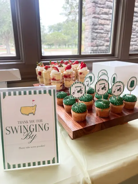 Golf Dessert Table with a Thank-You Sign and Cupcake Toppers