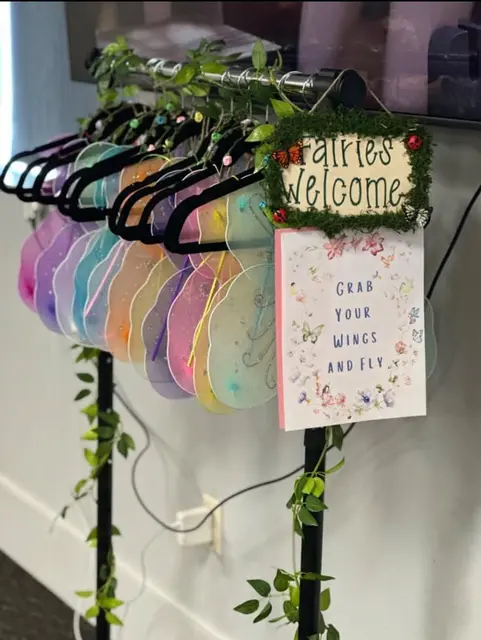 Fairy Wing Station with a Grab Your Wings Sign