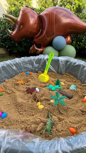 Dinosaur Sand Pit with a Triceratops Balloon