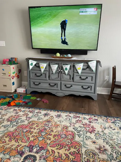 Masters Pennant Banner Across a TV Console