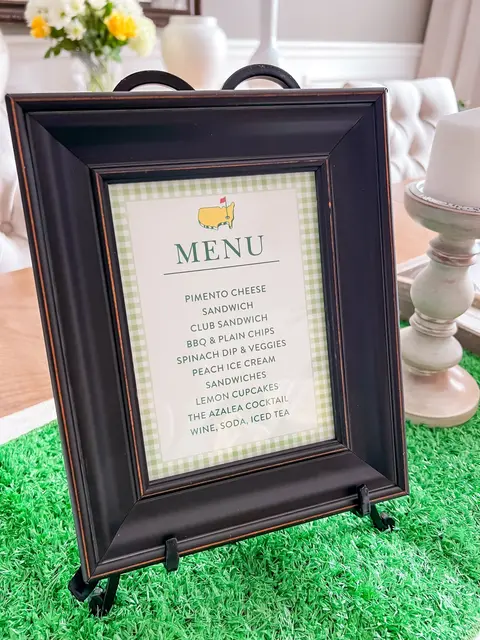 Masters Menu Sign in a Dark Frame on a Turf Runner