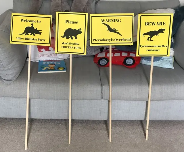 Yellow Dinosaur Welcome and Warning Signs