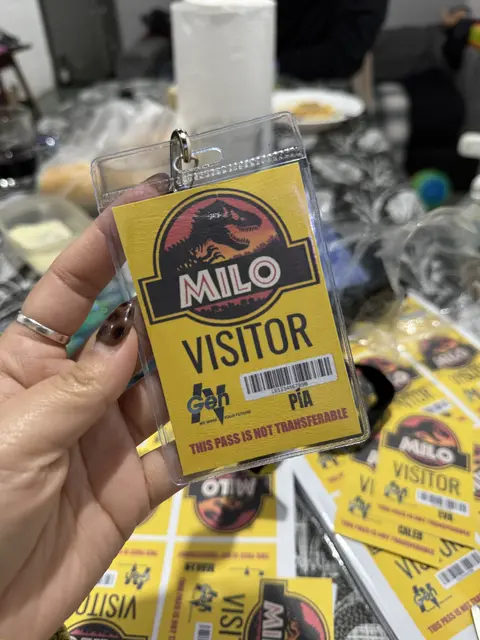 Dinosaur Visitor Pass with a Name Emblem