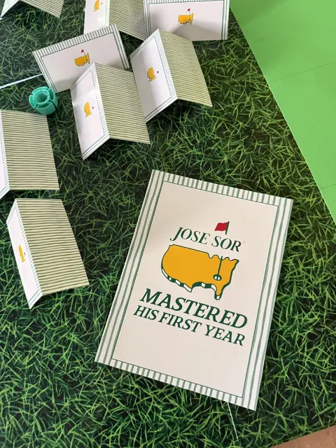 "Mastered His First Year" Sign with Striped Table Cards