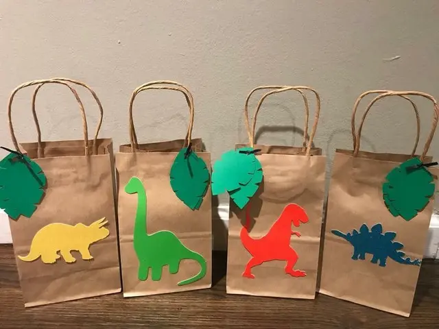 Colorful Dinosaur Favor Bags with Paper Leaf Tags