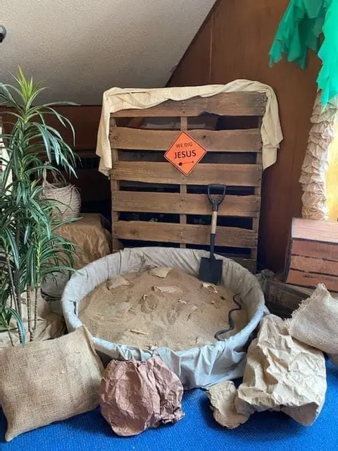 Dinosaur Dig Pit with a Pallet Backdrop