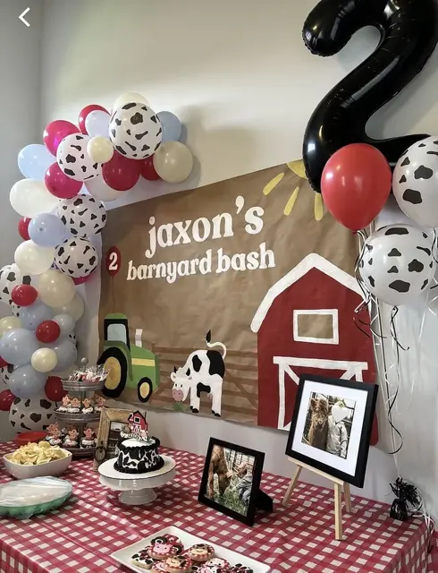Barnyard Backdrop with Cow-Print Balloons and Photo Displays