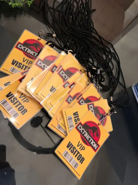Yellow Dinosaur VIP Visitor Passes with Lanyards
