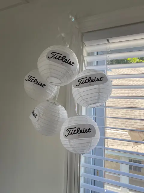 Hanging Golf Ball Lanterns by a Window