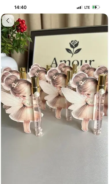 Fairy Cutout Favors with Gold-Capped Spray Bottles