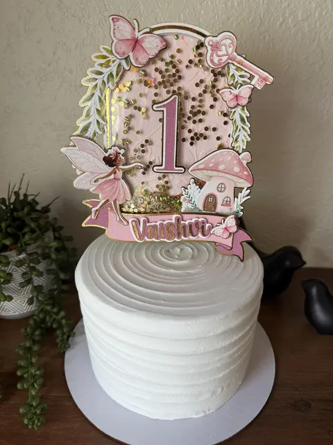 Pink Fairy Cake Topper with a Number 1 and Gold Confetti