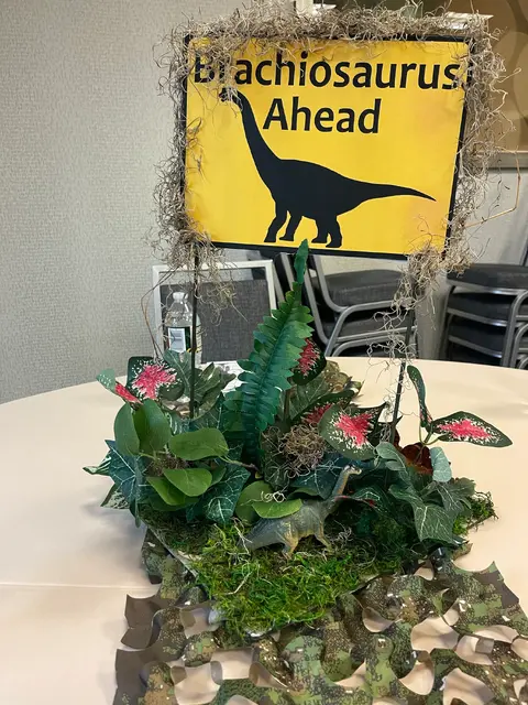 Brachiosaurus Table Centerpiece with a Yellow Sign